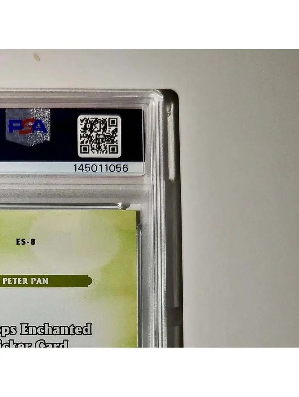 Peter Pan 2025 Topps Disney #ES-8 Enchanted Sticker Card Peter Pan PSA 8